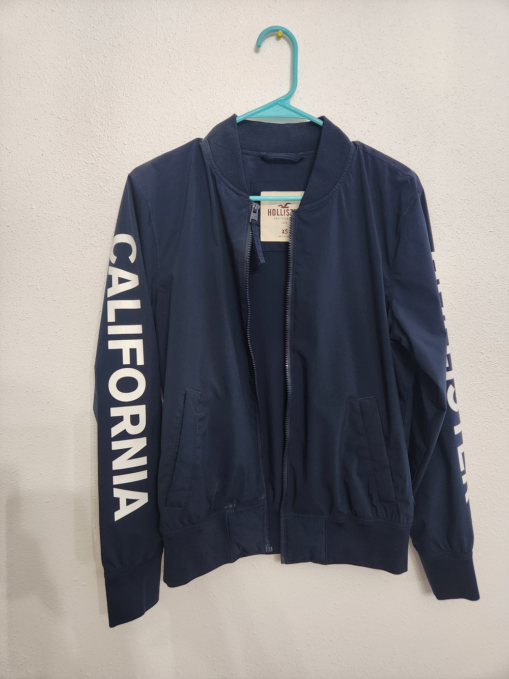 Hollister Men's Navy Bomber Jacket with California Sleeve Print